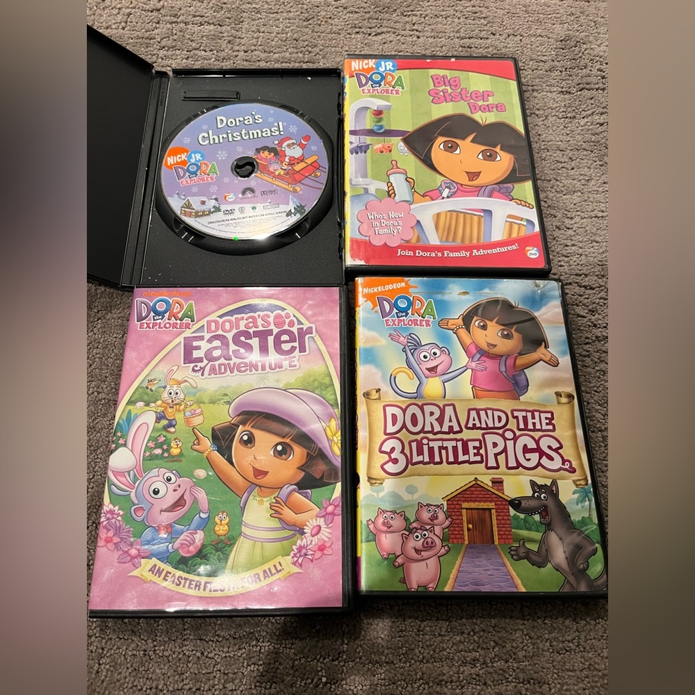 Nickelodeon Jr. Dora DVDs (4)
Dora’s Christmas
Easter
Big Sister
3 Little Pigs